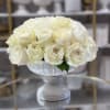Gorgeous display of all white premium roses in stunning urn vase 