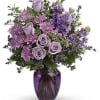 Soft lavender roses and dusky pink‑purple chrysanthemums come together in a lush