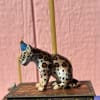 Show your Whimsy with this charming Leopard Cake Topper. Made of Ceramic