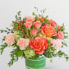 Bold and elegant, this orange rose arrangement captures the glow of sunset