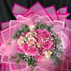 Thirty premium pink and blush roses, delicate baby's breath, and fresh eucalyptus