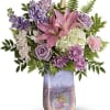 Make her feel grand with this glorious gift! Pastel-hued roses and lilies