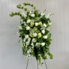 This Standing Spray includes Bells of Ireland, White Queen Anne's Lace, White