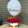 White Birthday Box features premium red roses, a personalized birthday bubble balloon