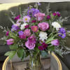 This arrangement feels like a soft spring garden gathered at its peak&mdash;fresh
