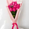 A timeless bouquet of vibrant pink roses, elegantly wrapped in premium Korean