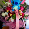 "A magical blend of cuddles, fresh blooms, and sweet treats! This show-stopping