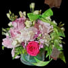 "An exquisite blend of romantic textures and captivating hues. This luxury low-vase