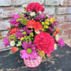Bright, playful color pops make this Petal Picnic flower arrangement an instant
