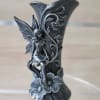 Matte metallic sculptural vase with ornate fairy relief - standalone decorative piece