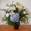 Brighten their home with the beauty of a bright blue sky. Arranged