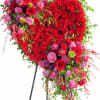 A bold heart of deep red blooms makes an immediate statement -