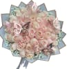 Bouquet of pale pink roses with butterfly decorations
