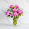 Celebrate the beauty of peony season with a lush arrangement of premium