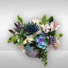 Recipe: Faux flowers and succulent greens

Vase dimension: 5 x 6 modern, white