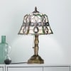 A softly luminous table lamp that feels like a keepsake, this Celtic