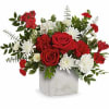 A bold statement of affection, the Loves Me Bouquet blends classic red