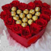 Heart-shaped box of red roses with gold-wrapped chocolates