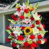 Arreglo Floral Premium con Lirios y Rosas en Base Decorativa 

Sorprende