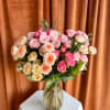 A hundred tiny roses, each one whispering beauty, joy, and gratitude. This