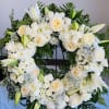The Elegant Ceremonial standing spray is a graceful and timeless floral tribute
