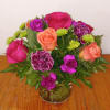 The Flirty Babe Bouquet combines fresh, vibrant blooms in a cheerful arrangement