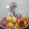Send a little sweetness with this medium sized fruit basket featuring seasonal