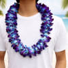 A bold and elegant orchid lei designed to celebrate Columbia University graduates.