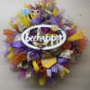 Hand designed mesh and ribbon wreath measuring approximately 30" from top to