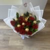 Beautiful red roses, Ferrero Rocher chocolates encapsulated in acrylic