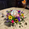 Featuring a LED lighted plastic garden themed globe (Batteries included),
this fresh floral