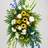 Sunlit Memories Standing Spray

Celebrate a life filled with warmth, kindness, and cherished