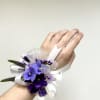 A cool-toned cluster of purple and lavender blooms creates an elegant, slightly