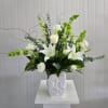 This White Ceramic Vase Arrangement Includes White Lily, White Snapdragon, Bells of