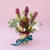 Tall, airy calla lilies and lilies create an elegant, contemporary statement-perfect as
