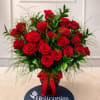 A lush cluster of deep red roses creates an immediate, romantic impact-perfect