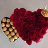 Heart-shaped rose arrangement with Ferrero Rocher chocolates and a small crown
