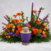 Bright, ceremonial and full of presence, this sympathy urn tribute centers on