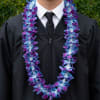 A lush purple, blue, and white, double orchid lei