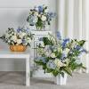 Featuring soothing tones of blue and white, the traditional arrangements of this