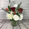 Wow, them with this lovely bouquet of red roses, tulips, and white