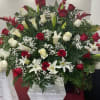 A formal, large-scale spray designed for church ceremonies and special events, this