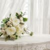 A soft, garden-inspired bridal bouquet that reads as timeless romance-perfect as wedding