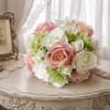A softly romantic bridal bouquet designed to make the bride feel cherished
