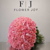 A breathtaking bouquet of 101 pink roses, symbolizing deep love, joy, and