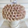 Large bouquet of blush roses in a white hat box with a ribbon bow