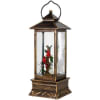 Decorative lantern with a small floral arrangement inside