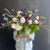 A beautiful mix of locally grown dahlias, scabiosa, and garden hydrangeas. Accentuated