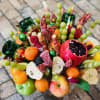 *Alcohol not included* Seasonal Gourmet Treats (meats, cheeses, fruits) all wrapped beautifully
