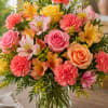 Bright, cheerful, and full of seasonal charm, the Summer Sunrise Bouquet features